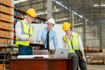 Team of factory workers or technicians celebrate the success together. Collective appreciation and team effort in a factory. Leadership in teamwork