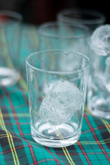 glass of ice on the table