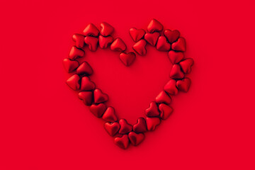Valentine's day. Big heart made from many small red hearts on red background, love concept