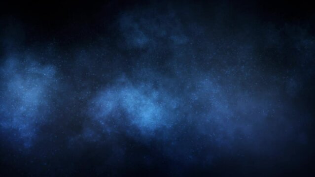 Blue Smoke Clouds and Particles Background 4K Loop features smoke cloud formations drifting down with snow-like particles in a blue atmosphere in a loop.