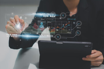 Professional businessman using laptop computer analyzes financial data,plans visions 2023 year,concept corporate future growth marketing,goal business strategy development investment with technology