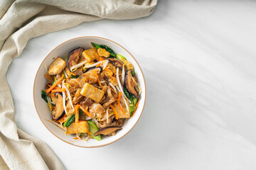stir-fried noodles with tofu and vegetables