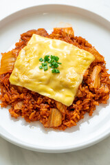 kimchi fried rice with pork and topped cheese