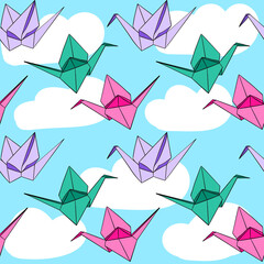 Hand drawn seamless pattern with japanese origami paper crames birds on blue sky white clouds background. Pink purple green japan asian toy for kids children nursery decor apparel, love hope peace