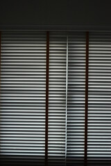 white blinds curtain put on the window, interior design