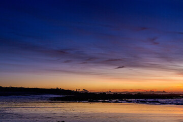 A beautiful sunset skies over the Pacific Ocean in California