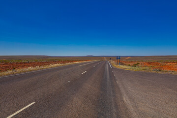 On the road side of the Stuart highway. Along the deserted barren vast landscape of the Australian...