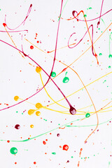 Colorful bright ink splashes on white