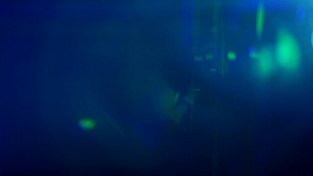 Light Leaks 4K effect background animation stock footage Lens glow flare bokeh overlays, For compositing over your footage, stylizing video, transitions. Defocused lamp flash rays effect. Light pulses