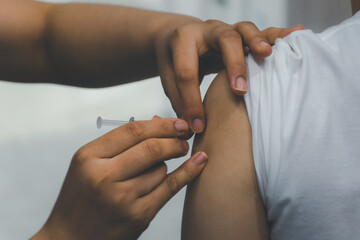 Patient asian woman get vaccinated the flu covid19