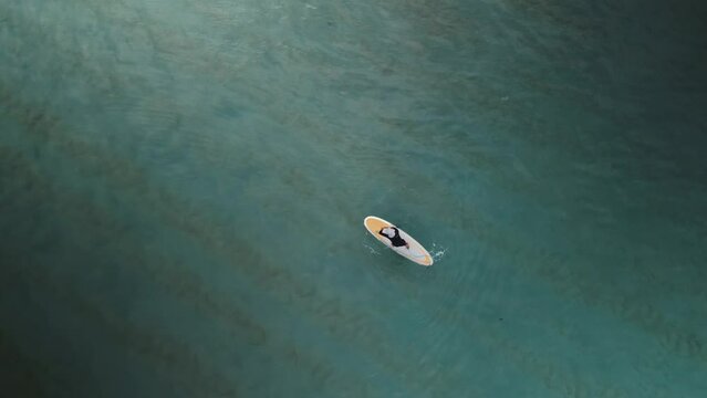 girl falls from a sapboard into sea, Drone Shoot.