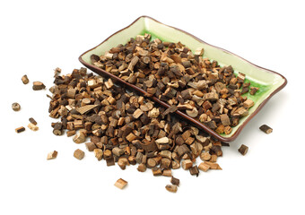Cinnamon twig chinese herbal medicine on a white background pestle over white background. Gui zhi