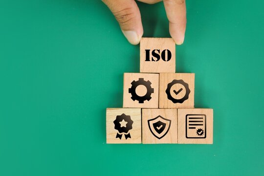 wooden square with ISO certificate icon, certified, standardization, warranty, control, quality. Quality control certification and standardization. International standards quality assurance concept
