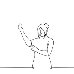 woman rolls up the sleeves of her sweater - one line drawing vector. concept toil or manual work