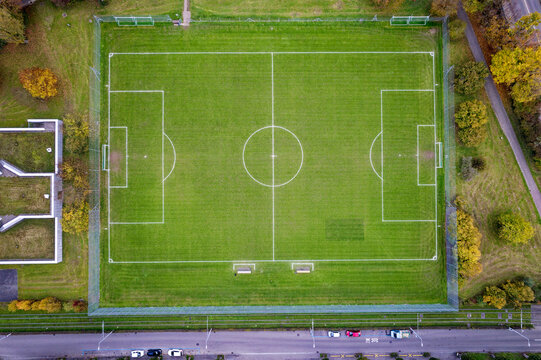 Aerial view of football field at City of Zürich on a foggy autumn late afternoon. Photo taken November 12th, 2022, Zurich, Switzerland.