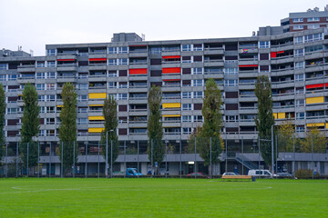 Apartment towers with football field in the foreground at City of Zürich on a cloudy autumn late afternoon. Photo taken November 12th, 2022, Zurich, Switzerland.