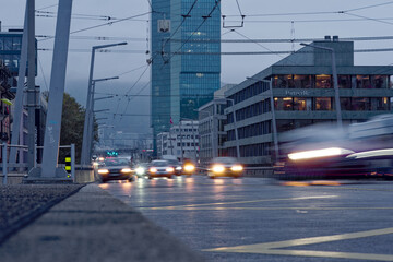 City highway hard bridge with blurry motion of cars at City of Zürich on a cloudy autumn day. Photo taken November 12th, 2022, Zurich, Switzerland.