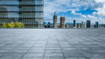 Empty square floor and city skyline with modern buildings in Ningbo, Zhejiang, China. 