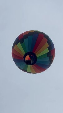 EREVAN,ARMENIA-OCTOBER 15,2022: Large, multi-colored, balloon flying