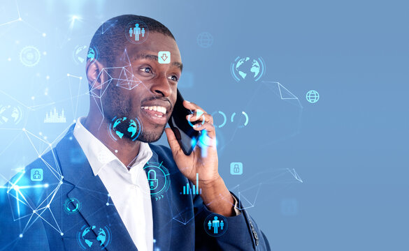 African businessman talking on the phone, big business data hologram