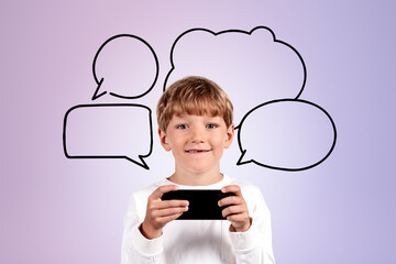 Smiling kid with phone in hands, copy space speech bubble