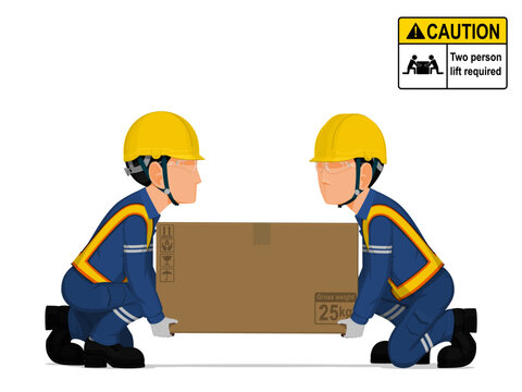 Two workers is lifting a big box on the floor