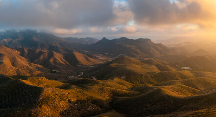 landscape of semi-desert mountain landscape in southern Spain at sunset