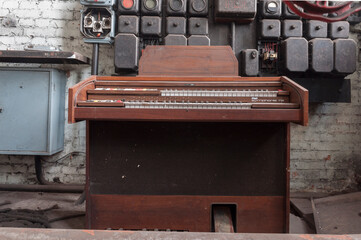Piano in old abandoned industrial railway boiler house in central Poland, Europe