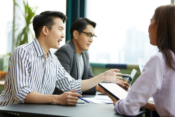 businessman meeting and talking about work or project with colleague in the office