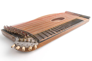 High angle closeup horizontal studio shot of vintage, old wooden zither isolated on white...