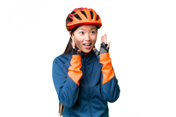 Young cyclist woman over isolated chroma key background with surprise facial expression