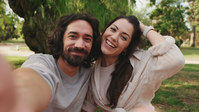 Close-up of couple in love taking selfie on mobile phone - Powered by Adobe
