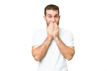 Young handsome blonde man over isolated chroma key background happy and smiling covering mouth with hands