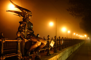 Joker statue  in a foggy night in Budapest, Hungary