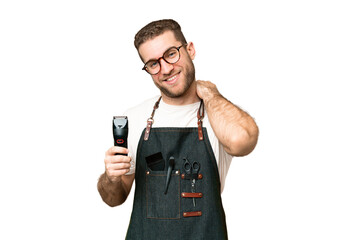 Barber man in an apron over isolated chroma key background laughing