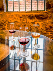 pouring wine on glasses - preparing wine tasting