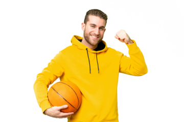 Young handsome blonde man over isolated chroma key background playing basketball and proud of himself