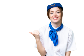 Airplane stewardess over isolated chroma key background pointing to the side to present a product