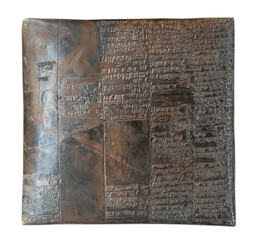 Cuneiform tablet isolated on white.