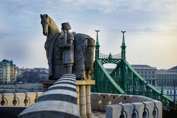 Fototapeta na wymiar Statue and freedom bridge in Budapest, Hungary