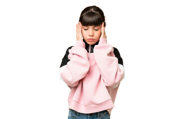 Little girl over isolated green chroma key background with headache