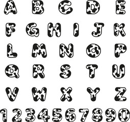 Cow style alphabet with black spots, font