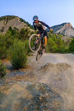 Male Mountain Biker rides down Hogs back near Durango, Colorado, USA