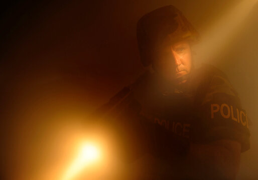 A Special Weapons and Tactics (SWAT) team demonstrates how to clear rooms by using smoke and flashlights to maneuver.