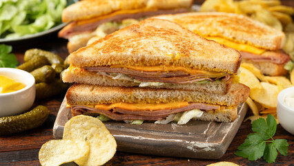 Fried Bologna Sandwich with Cheese and iceberg lettuce © grinchh