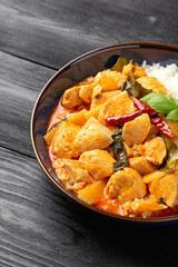 Thai red curry with chicken, vegetables and rice