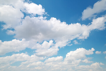 Naklejka na ściany i meble Blue sky with clouds at day.