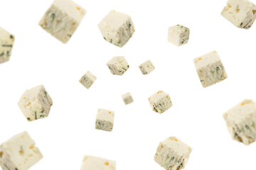 Falling blue cheese, isolated on white background, selective focus