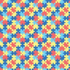 Colorful autism pattern with puzzles pieces. Seamless background with yellow, blue and red puzzles. World Autism Awareness Day April 2. Vector illustration