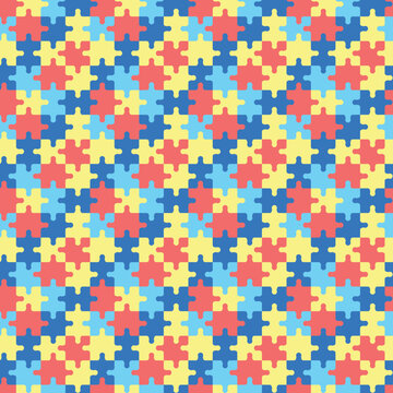 Colorful autism pattern with puzzles pieces. Seamless background with yellow, blue and red puzzles. World Autism Awareness Day April 2. Vector illustration